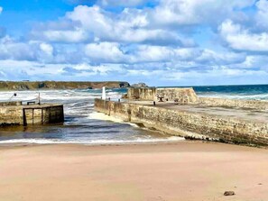 On the beach, sun-loungers - Hill Crest - cliff top cottage with stunning views of the bay (Cullen)