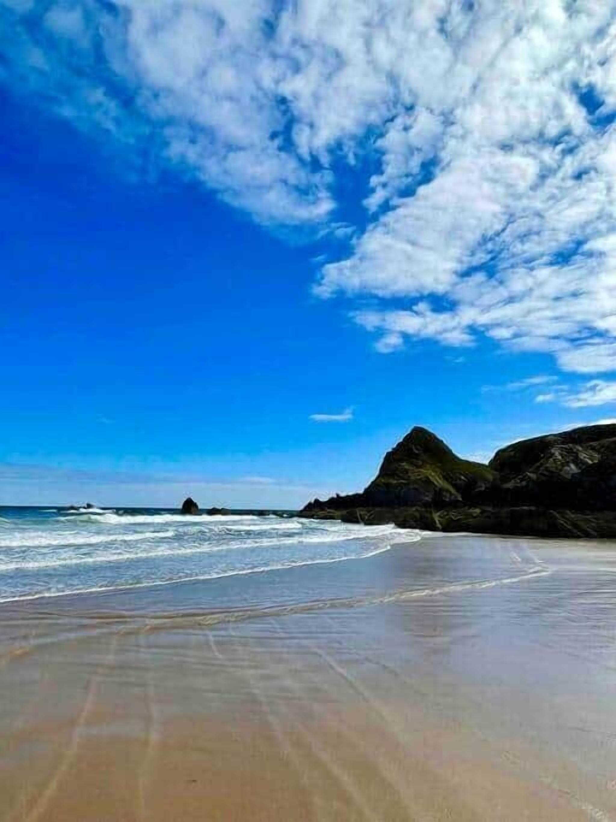 On the beach, sun-loungers, beach towels