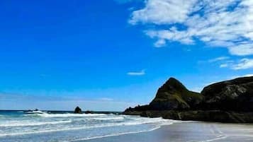 On the beach, sun-loungers, beach towels