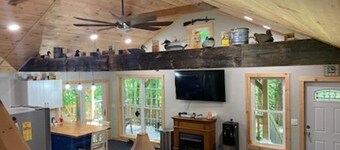 Newly built cabin in cozy wooded setting