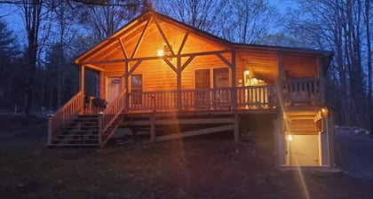 Newly built cabin in cozy wooded setting