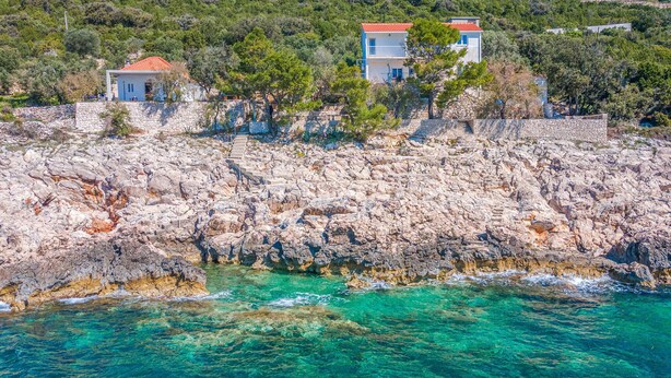 A coastal property with rocky terrain and clear turquoise waters. - Gorgeous home in Potomje with WiFi (Potomje)