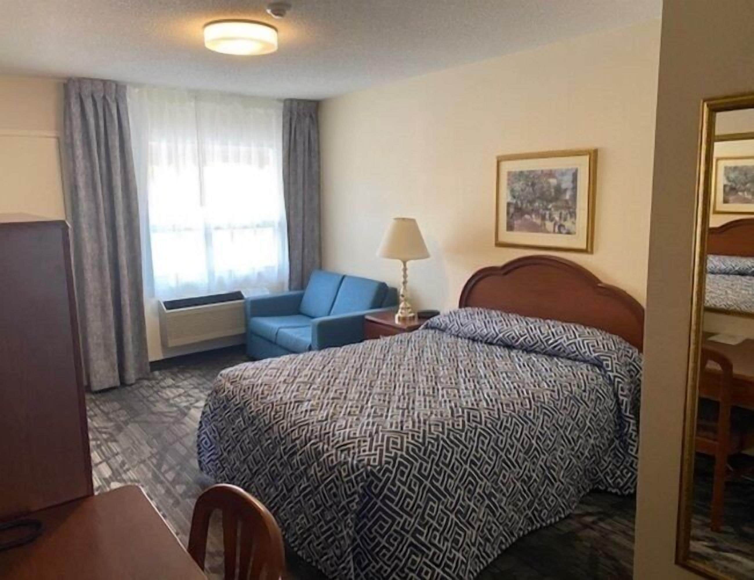 Comfort-værelse | Select Comfort-senge, mørklægningsgardiner, gratis Wi-Fi, sengetøj