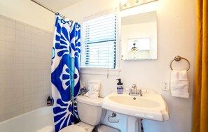 Hair dryer, towels, soap, shampoo