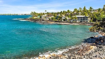 On the beach, sun-loungers, beach towels