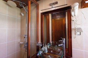 Shower, hydromassage showerhead, designer toiletries, hair dryer