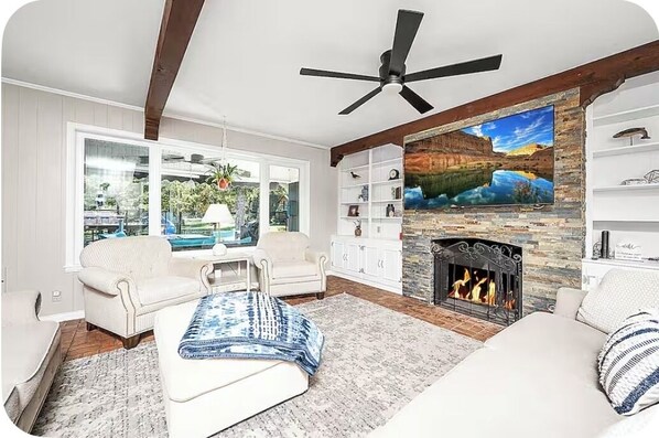 Smart TV, fireplace, books