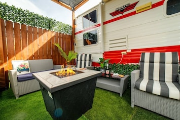Roast marshmallows under the stars on a summer evening as you swap ghost stories around the firepit.
