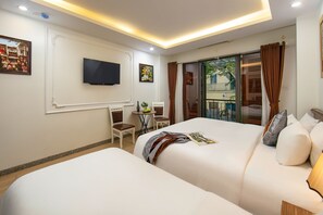 Executive Triple Room, Balcony, City View | Premium bedding, down duvets, pillow-top beds, free minibar items - Tunger Premium Hotel (Hanoi)