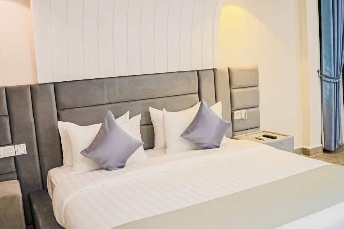 2 habitaciones, minibar y caja de seguridad en la habitación