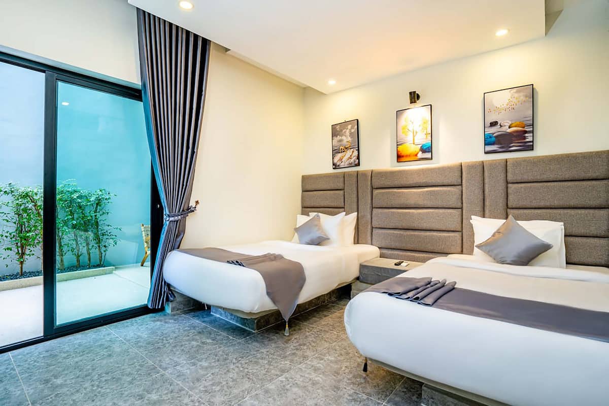 2 habitaciones, minibar y caja de seguridad en la habitación
