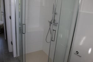 Shower, bidet, towels, soap