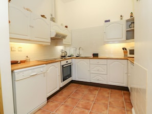 Fridge, electric kettle, toaster, cookware/dishes/utensils
