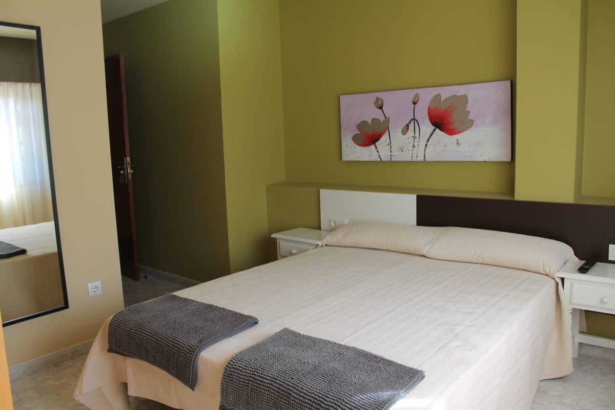 Desk, free WiFi, bed sheets