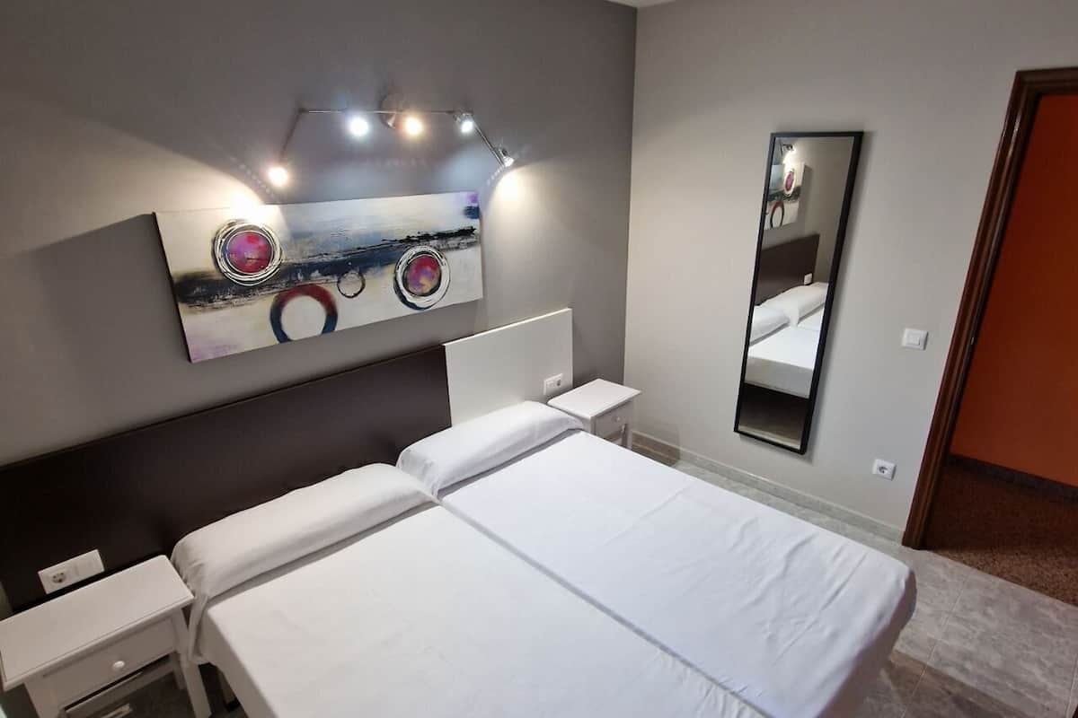 Desk, free WiFi, bed sheets