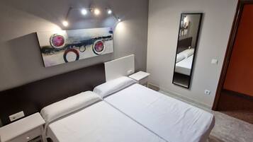 Desk, free WiFi, bed sheets