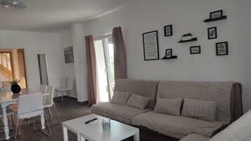 Villa (Three Bedroom Villa with Swimming Poo) | Living room | 25-inch flat-screen TV with satellite channels, TV