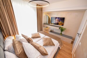 1 habitación, tabla de planchar con plancha y cuna de viaje 