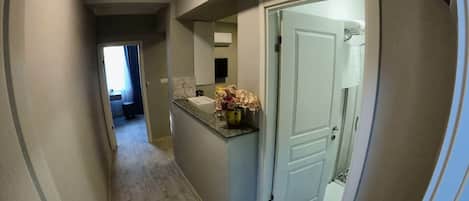 Fridge, microwave, cookware/dishes/utensils, dining tables