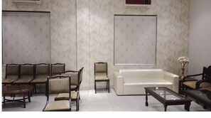 Habitación doble Deluxe | Salón ejecutivo