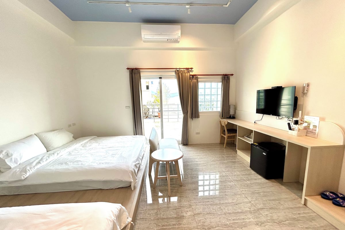 Business Triple Room, Partial Sea View | Desk, laptop workspace, blackout drapes, soundproofing