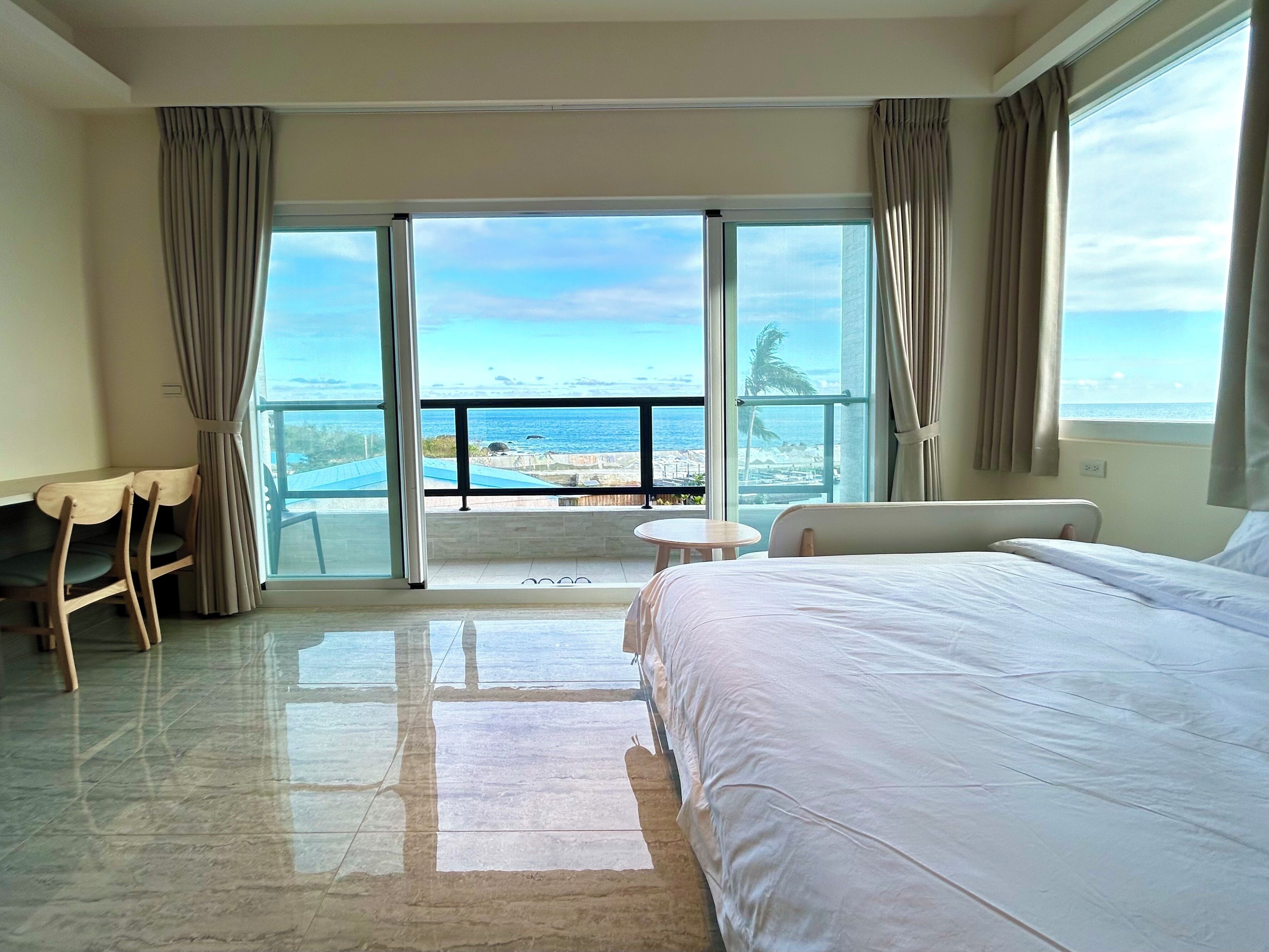 Deluxe Quadruple Room, Multiple Beds, Sea View | Terrace/patio