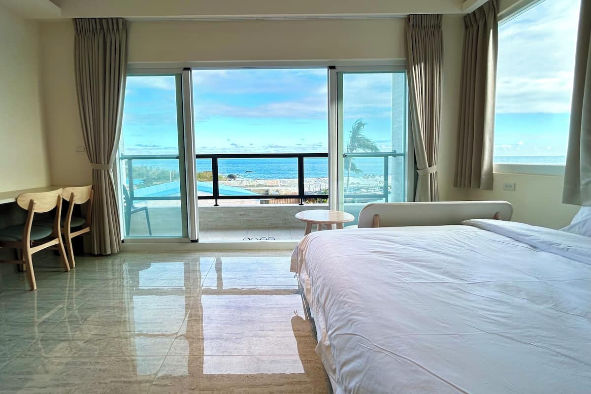 Deluxe Quadruple Room, Multiple Beds, Sea View | Terrace/patio