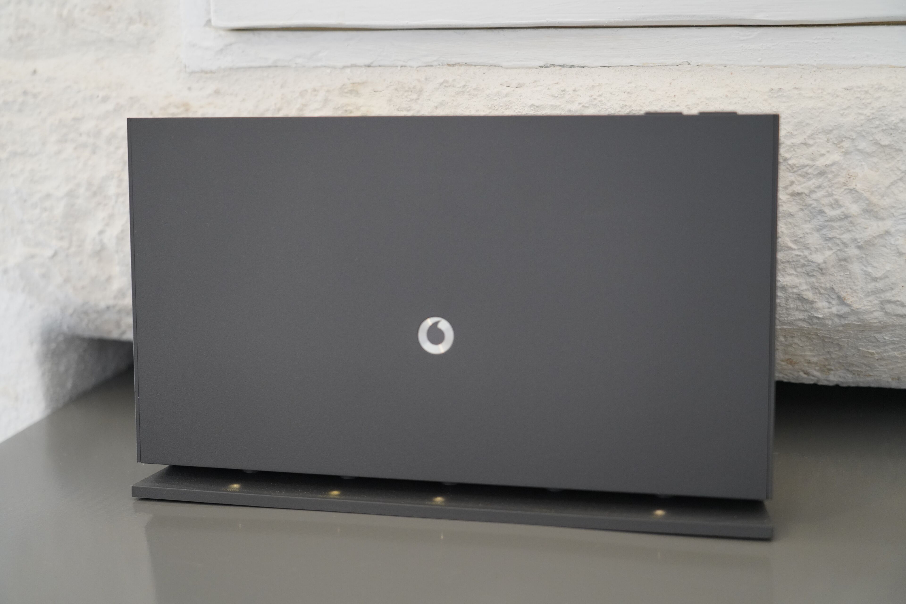 A closed laptop on a flat surface.
