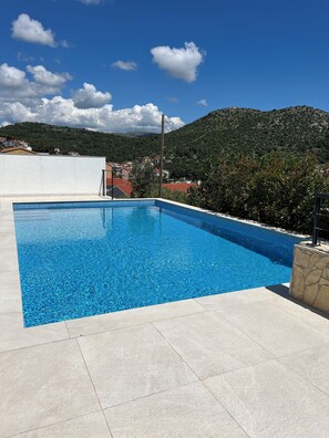 Piscine extérieure, piscine chauffée