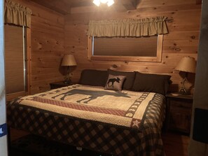 Main floor bedroom with king bed. 