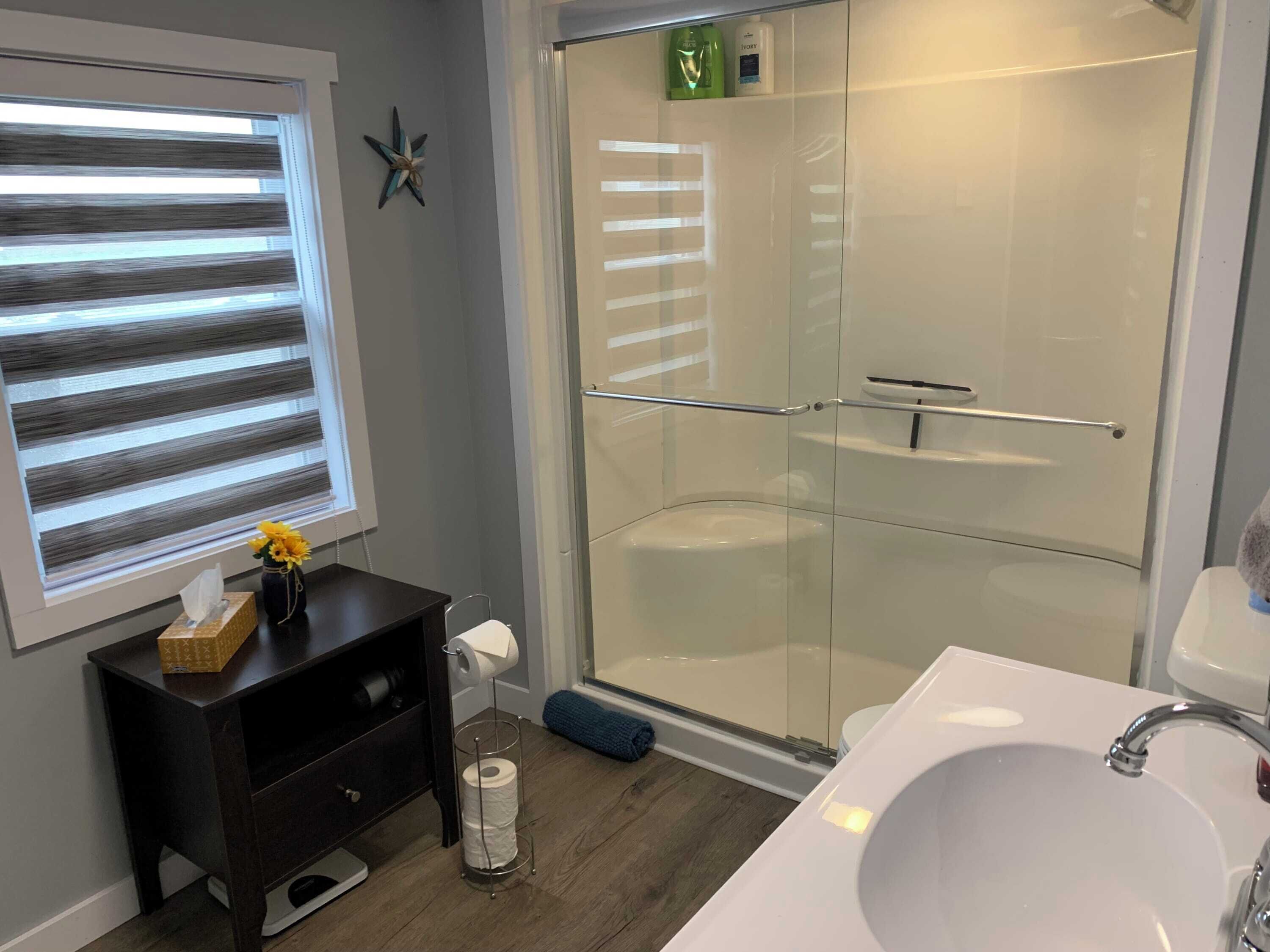 Bathtub, hair dryer, towels