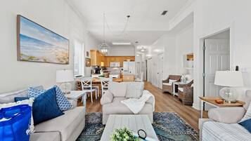 Condo, Multiple Beds, Balcony, Garden View (Seagrove Highlands 1406) | Living area | 50-inch TV with digital channels