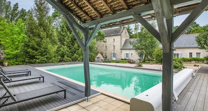Old mill from the 19th century and its pond in the heart of the Châteaux of the Loire Valley