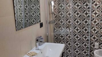 Rainfall showerhead, free toiletries, hair dryer, bathrobes