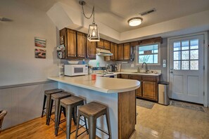 Fridge, microwave, stovetop, dishwasher - Holden Beach Vacation Rental: Short Path to Beach! (Holden Beach)