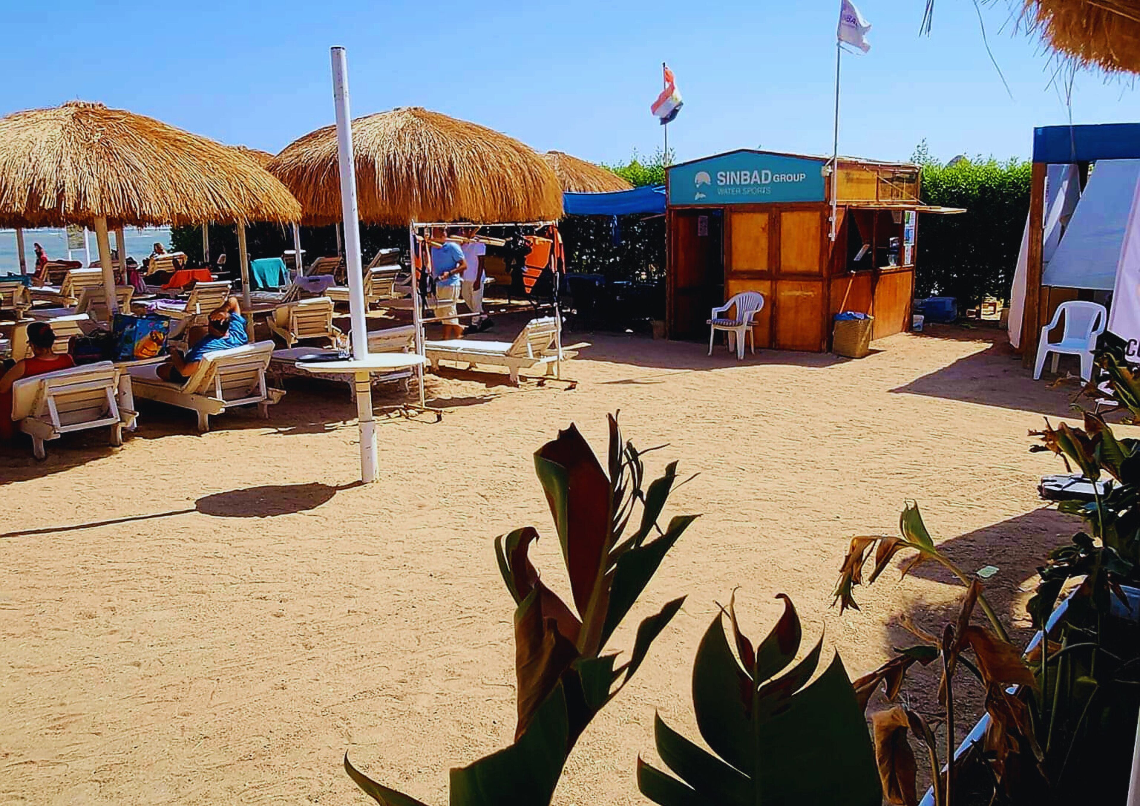 Private beach, beach umbrellas, beach volleyball, beach bar