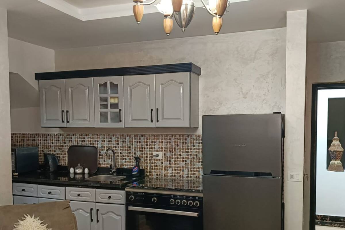 panoramic apartment | private kitchen | full-sized fridge, microwave, oven, high chair