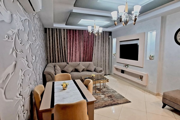 Panoramic-Apartment | Wohnbereich | 55-Zoll-LED-Fernseher mit Satellitenempfang, Fernseher