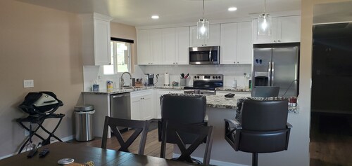 Relax & Enjoy the sun on the Covered  Patio & Golf Course View