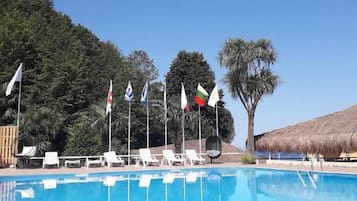 Seasonal outdoor pool, pool umbrellas