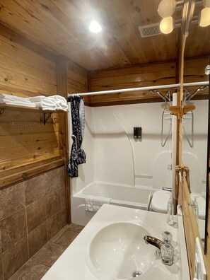 Shower, towels, soap, shampoo