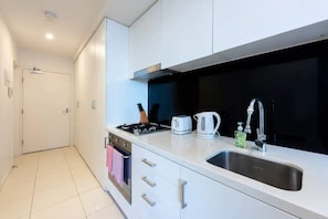 Basic Apartment, 2 Queen Beds | Private kitchen