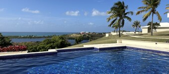 Beautiful 7.7 acre estate with a huge home and stunning views of the Caribbean