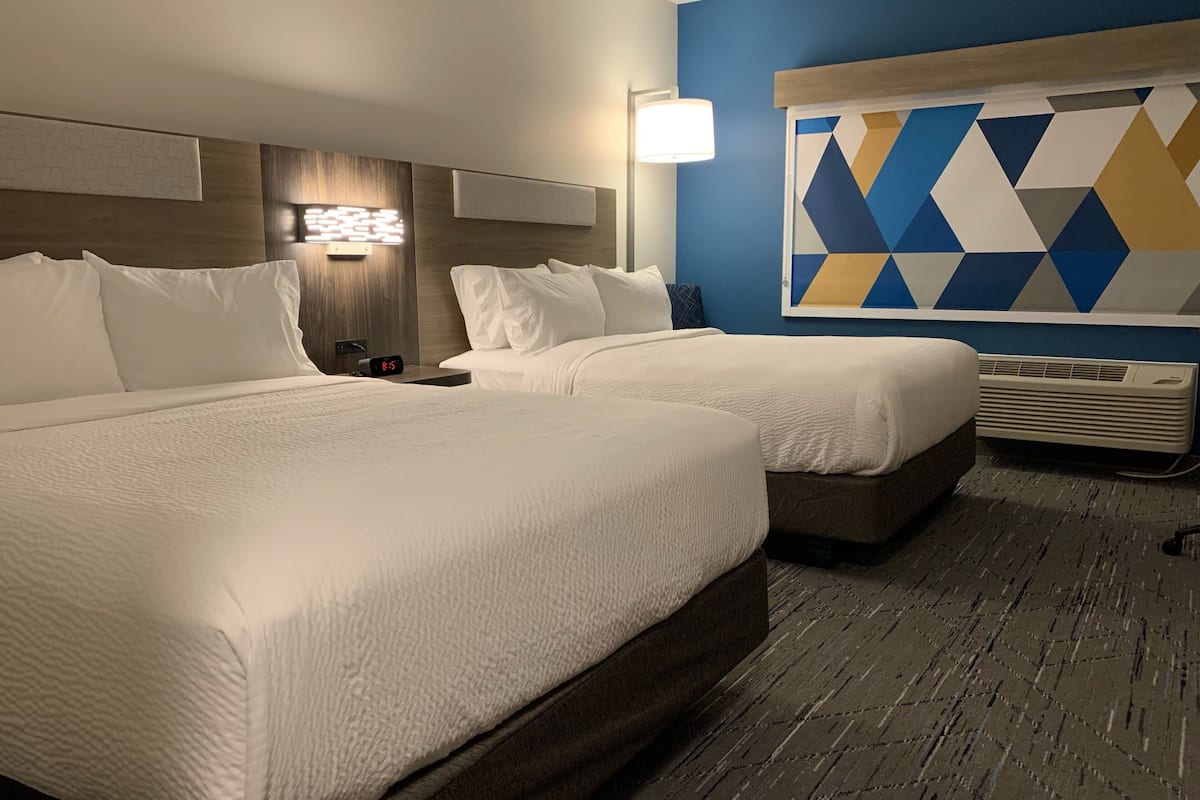 desk, laptop workspace, blackout curtains, iron/ironing board