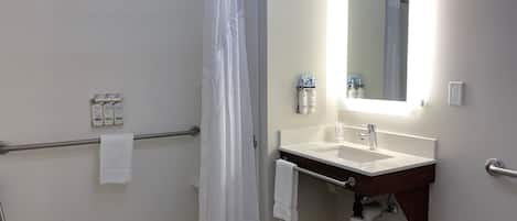 Desk, laptop workspace, blackout drapes, iron/ironing board