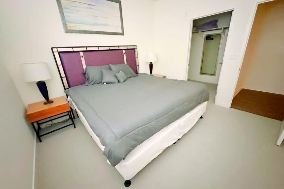 Premium bedding, memory foam beds, desk, laptop workspace