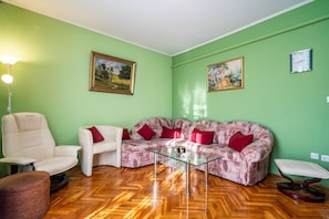 Apartment (Two Bedroom Apartment with Terrace) | Living room | 25-inch flat-screen TV with cable channels, TV