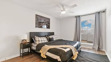 1 bedroom, desk, iron/ironing board, travel crib