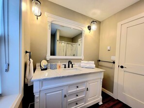 Shower, hair dryer, soap, shampoo