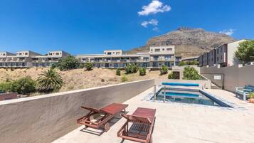 Basic Apartment, Multiple Beds | Pool | A heated pool